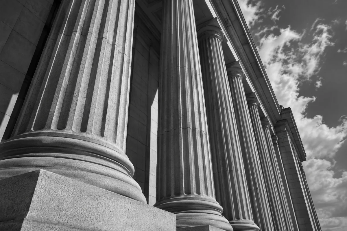 Conceptual monochrome architecture of a monumental stone colonnade